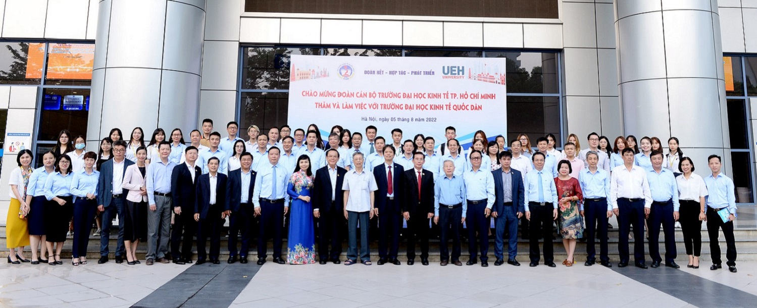 University of Economics Ho Chi Minh City (UEH) exchanging working experiences and signing a cooperation agreement on student exchange with National Economics University (NEU)